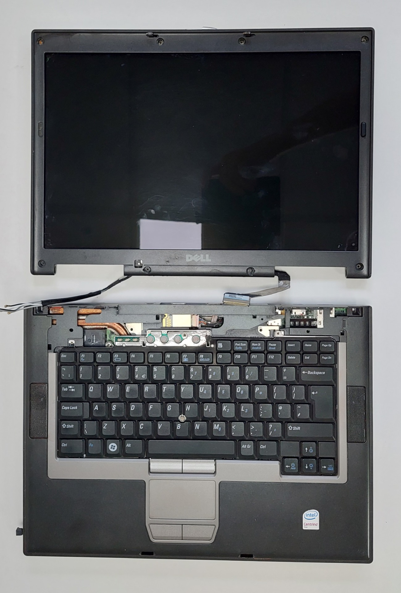 Laptop with screen and keyboard removed from each other