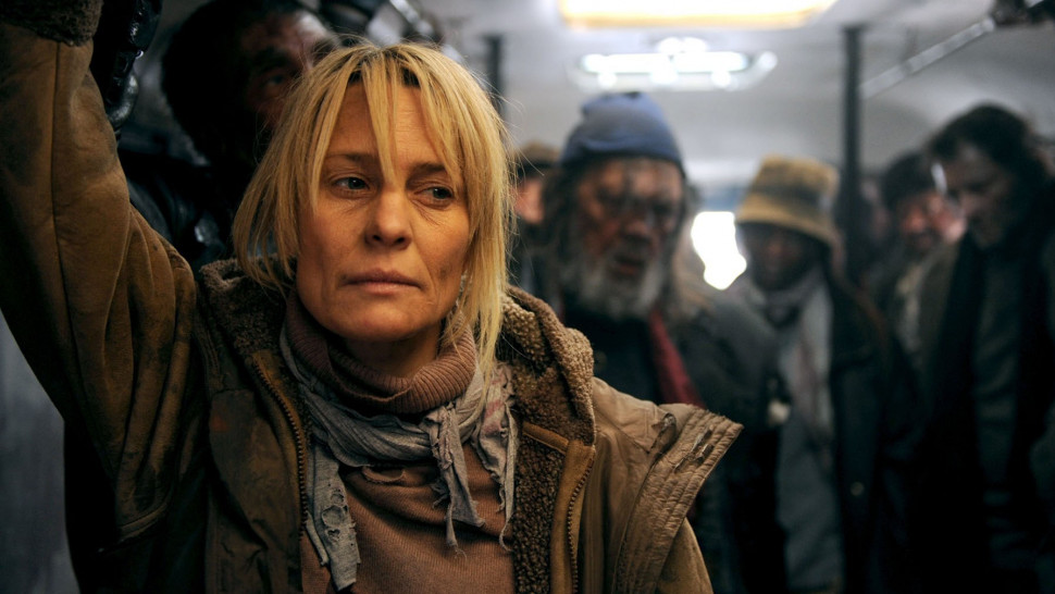 Shot from the congress of robin wright on a crowded train in a dystopian future