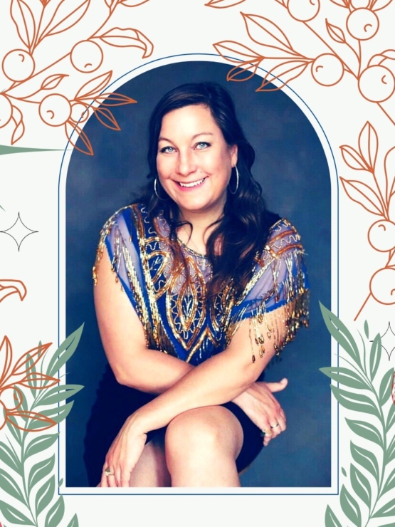 portrait of a white woman in a dress with long dark hair smiling, with a decorative border